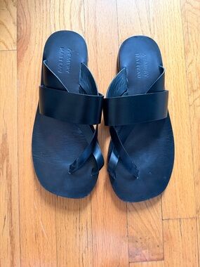 A Emery x  Matteau Black Leather Cross-Strap Sandals